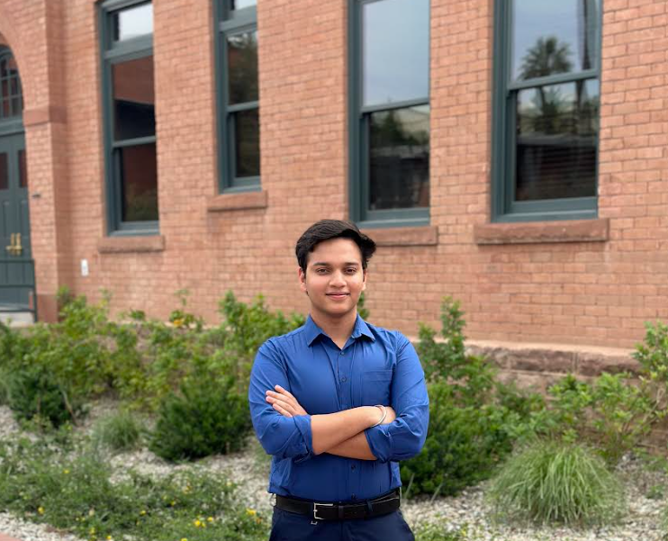 Divyanshu Tandon standing in a blue shirt